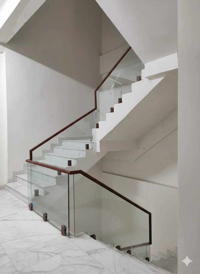 Staircase glass railing